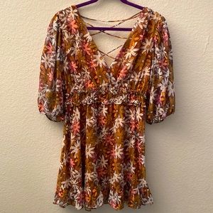 Gold, pink and white floral flowy short dress. Brand is Lush, size medium.